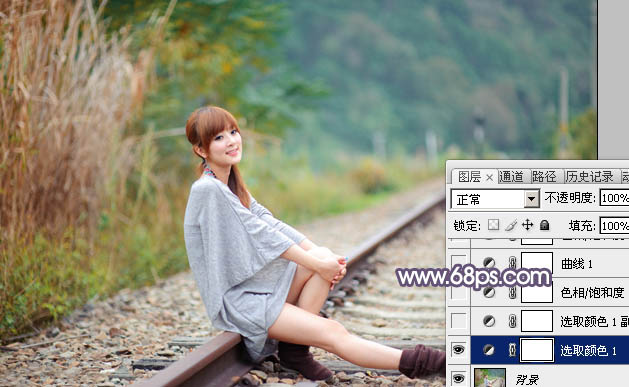 Photoshop给铁轨上的美女加上甜美的粉调蓝黄色5