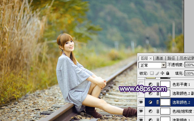 Photoshop打造小清新的淡黄色秋季铁轨美女图片14