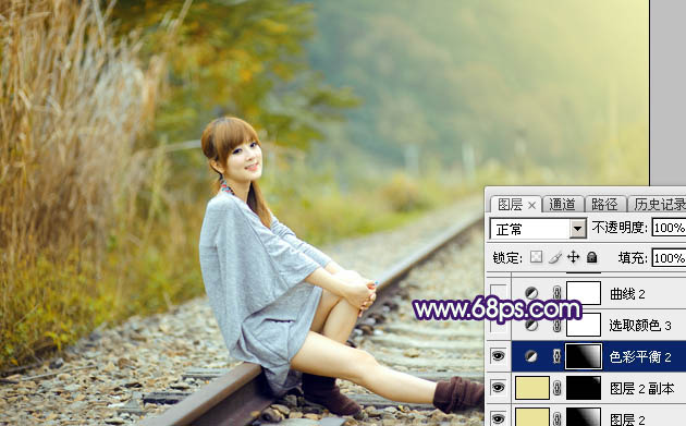 Photoshop打造小清新的淡黄色秋季铁轨美女图片22