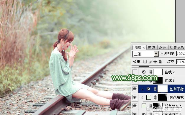 Photoshop为坐在铁轨的美女加上甜美的淡调粉绿色30