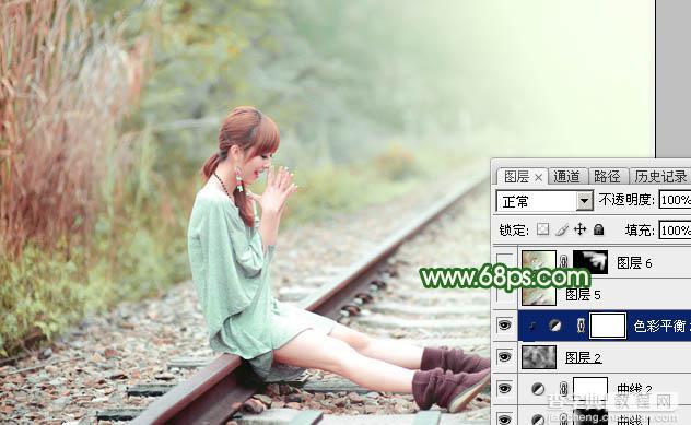 Photoshop为坐在铁轨的美女加上甜美的淡调粉绿色38