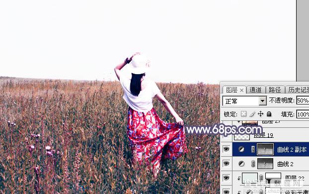Photoshop将草原人物图片调制出唯美的暗调红蓝色26